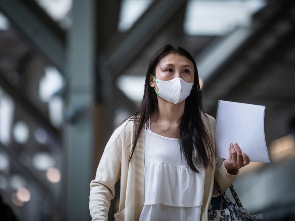 Travellers are pictured at YVR international airport in Richmond, B.C., on Monday. The federal government says it's dropping all COVID-19 measures at borders on Saturday, meaning travellers will no longer need to provide proof of vaccination when entering Canada or wear masks on planes and trains.  (Ben Nelms/CBC - image credit)