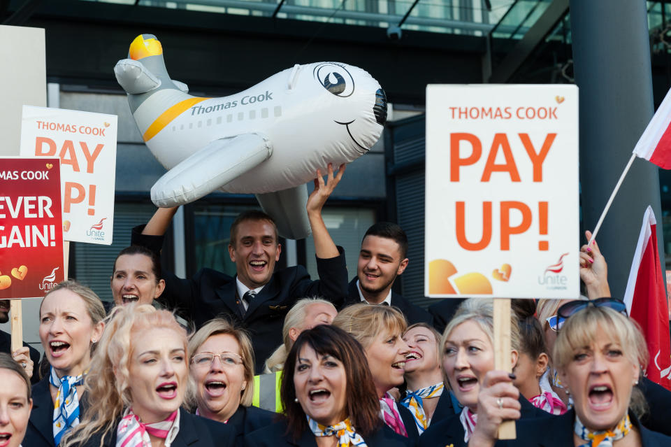 Thomas Cook workers gather at the Department of Business, Energy and Industrial Strategy (BEIS) to protest and hand in a petition with over 10,000 signatures, calling on Secretary of State for Business Andrea Leadsom to ensure the workers affected by the firm's collapse receive their unpaid wages on 02 October, 2019 in London, England. Around 9,000 Thomas Cook employees in the UK lost their jobs on Monday last week as the worlds oldest travel company went into liquidation over its debts. (Photo by WIktor Szymanowicz/NurPhoto via Getty Images)