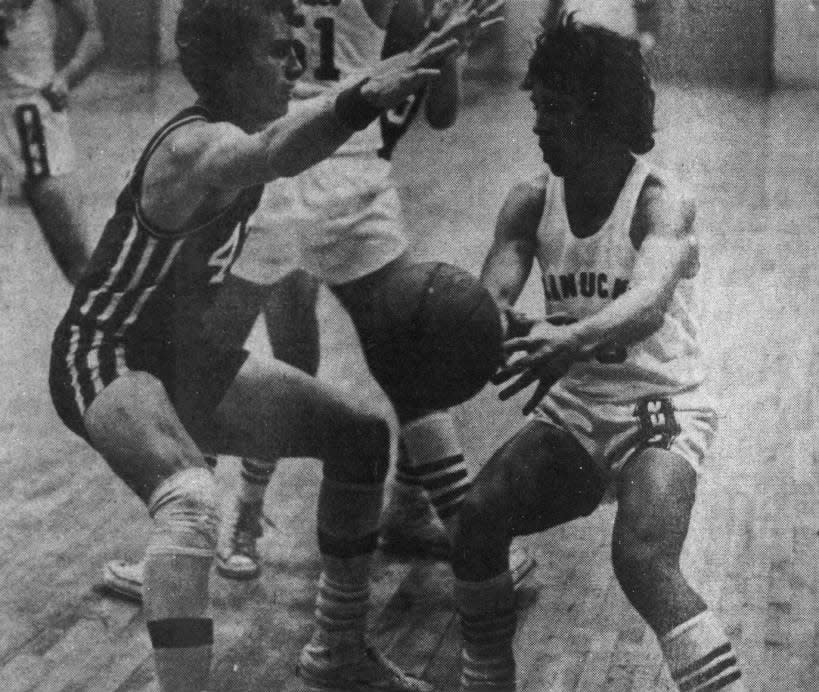 Jeff Donlan of Bernards High blocks the path of Dave Deluccia of North Plainfield during an opening-round game in the Somerset County Basketball Tournament.