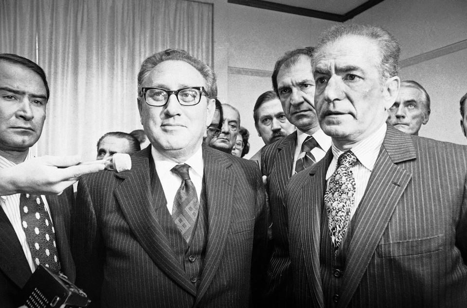 Henry Kissinger with the Shah of Iran, Mohammed Reza Pahlevi in 1975 (Dieter Endlicher / AP)