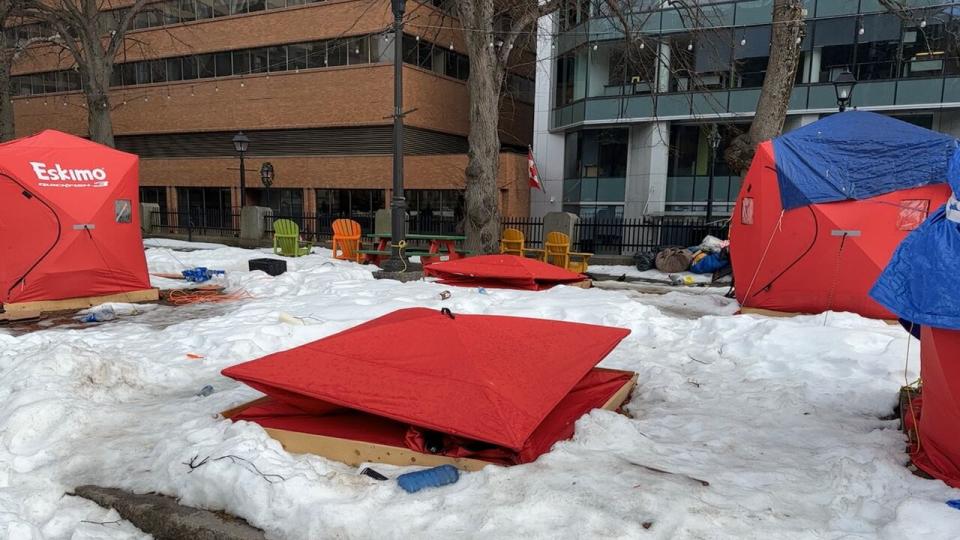 Two flattened tents at Grand Parade tent encampment on Sunday, Feb. 11, 2024.