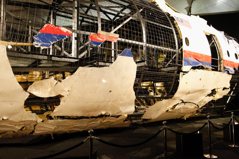 GILZE-RIJEN AIR BASE, Oct. 13, 2015-- Wreckage of flight MH17 is seen after the presentation of the investigation report on the cause of its crash, at the Gilze-Rijen air base, the Netherlands, on Oct. 13, 2015. The crash of flight MH17 on 17 July last year was caused by the detonation of a 9N314M-type warhead launched from eastern Ukraine using a Buk missile system, said the investigation report published Tuesday by the Dutch Safety Board (DSB). (Xinhua/Sylvia Lederer via Getty Images)