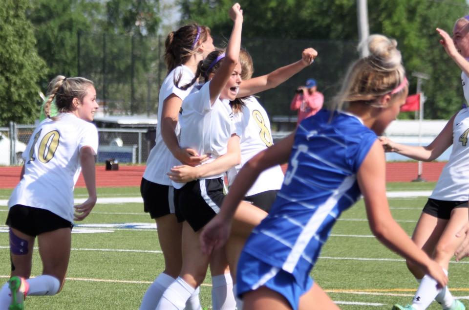 Sacred Heart-Griffin freshman Ava Hancock celebrates scoring the go-ahead goal in a 1-0 double-overtime victory over Alton Marquette in the Class 1A Quincy Notre Dame Sectional semifinal at Illinois College on Wednesday, May 18.