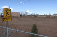 The Hunters Point Boarding School, a small grade school on the outskirts of the Navajo Nation capital, is seen in St. Michaels, Ariz., Friday, April 23, 2021. First Lady Jill Biden visited the school as part of a three-day trip to the U.S. Southwest. Staff at Hunters Point Boarding School in St. Michaels have repainted the building, upgraded the washer and dryer in the dorms, placed plexiglass between beds and installed hand-washing stations. (AP Photo/Felicia Fonseca)