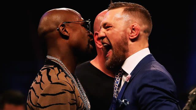 McGregor gets in Mayweather's face. Pic: Getty