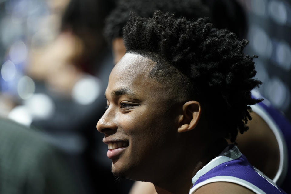 Kansas State's Tylor Perry speaks to the media during the NCAA college Big 12 men's basketball media day Wednesday, Oct. 18, 2023, in Kansas City, Mo. (AP Photo/Charlie Riedel)