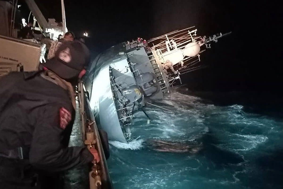 The HTMS Sukhothai warship, pictured on its side before sinking in the Gulf of Thailand on Sunday  (ROYAL THAI NAVY/AFP via Getty Im)