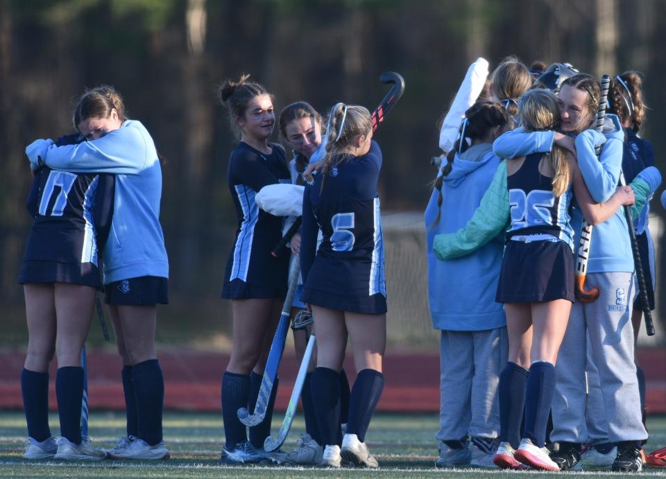 NORWELL 11/19/22  Sandwich players console eash other beside their goal at game's end. Sandwich was shut out by Watertown 2-0 in the girls field hockey Div. 3 state final match played at Norwell HS on Saturday. Cape Cod Times/Steve Heaslip