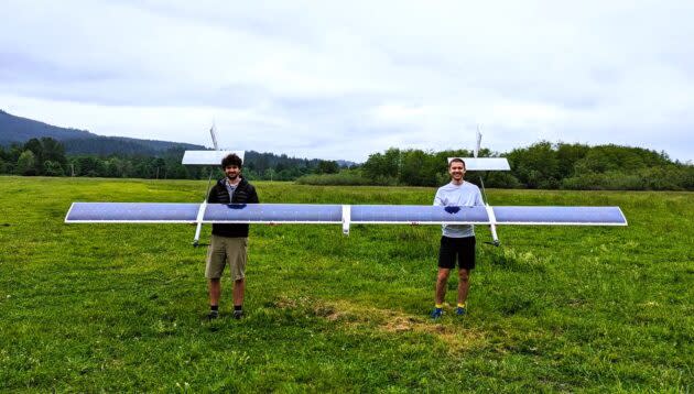 Radical’s co-founders, CTO Cyriel Notteboom and CEO James Thomas, carry a solar-powered demonstrator aircraft that flew continuously for more than 24 hours during a test flight last year. (Radical Photo).