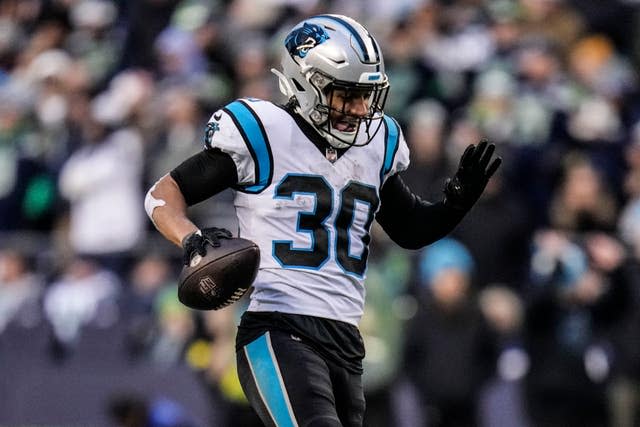 Carolina Panthers running back Chuba Hubbard (30) celebrates during the second half the match against the Seattle on Seahawks, Sunday, Dec. 11, 2022, in Seattle