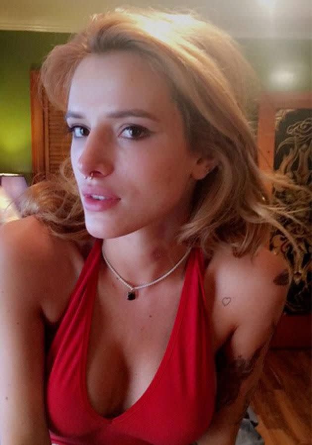 Watch The Cringe Worthy Moment Bella Thorne Gets A Septum Piercing