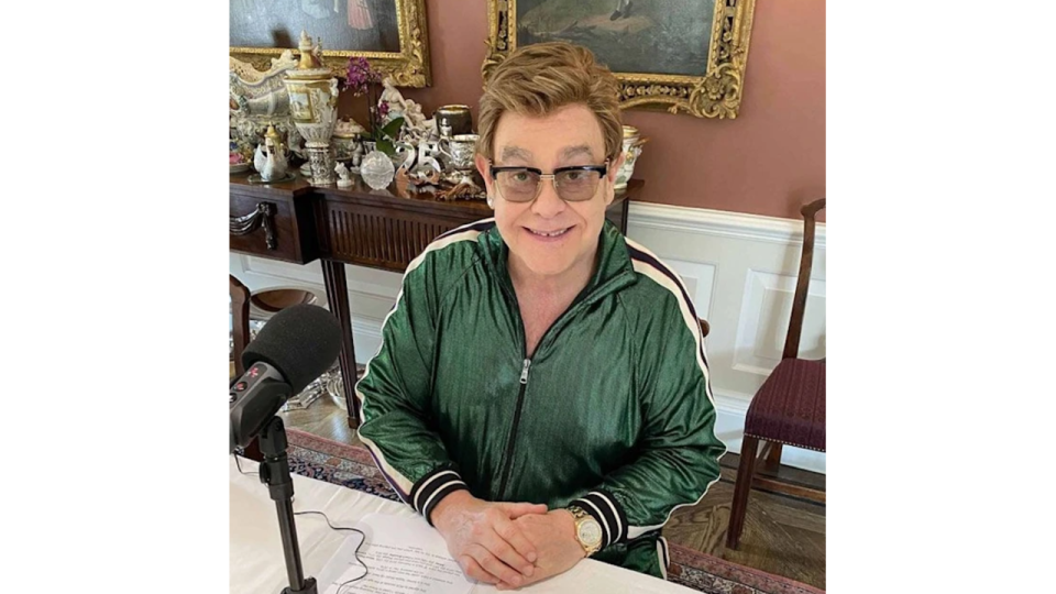 Elton John in his dining room at his Berkshire property