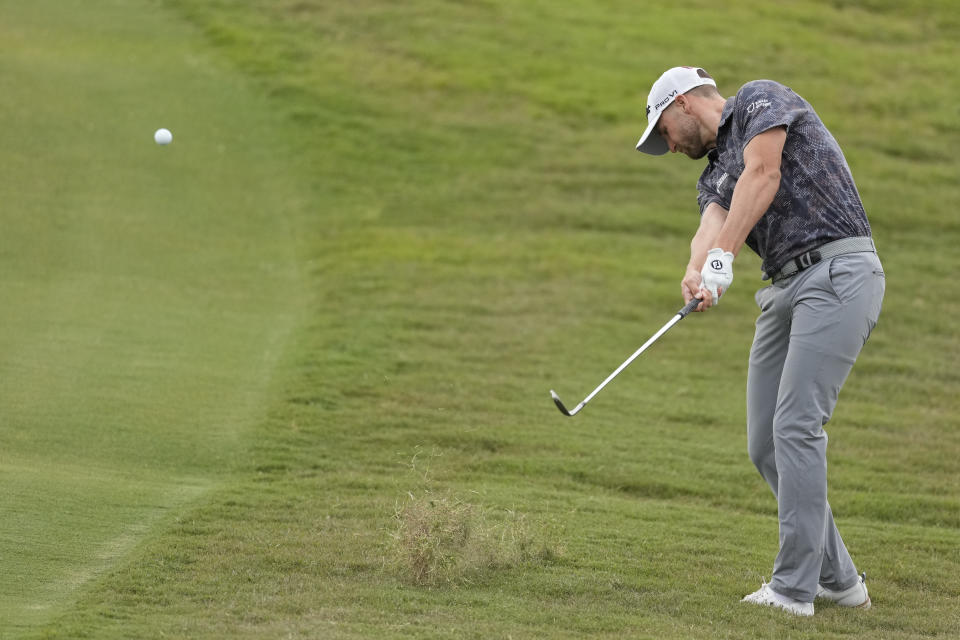 Wyndham Clark hits from the rough on the 16th hole during the first round of the U.S. Open golf tournament at Los Angeles Country Club on Thursday, June 15, 2023, in Los Angeles. (AP Photo/Marcio J. Sanchez)