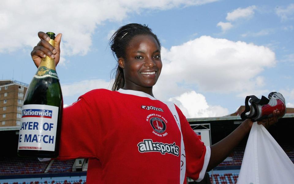 Eniola Aluko of Charlton celebrates winning player of the match and winning the Women's FA Cup Final match between Charlton and Everton at Upton Park on May 2, 2005 in London, England. - GETTY IMAGES