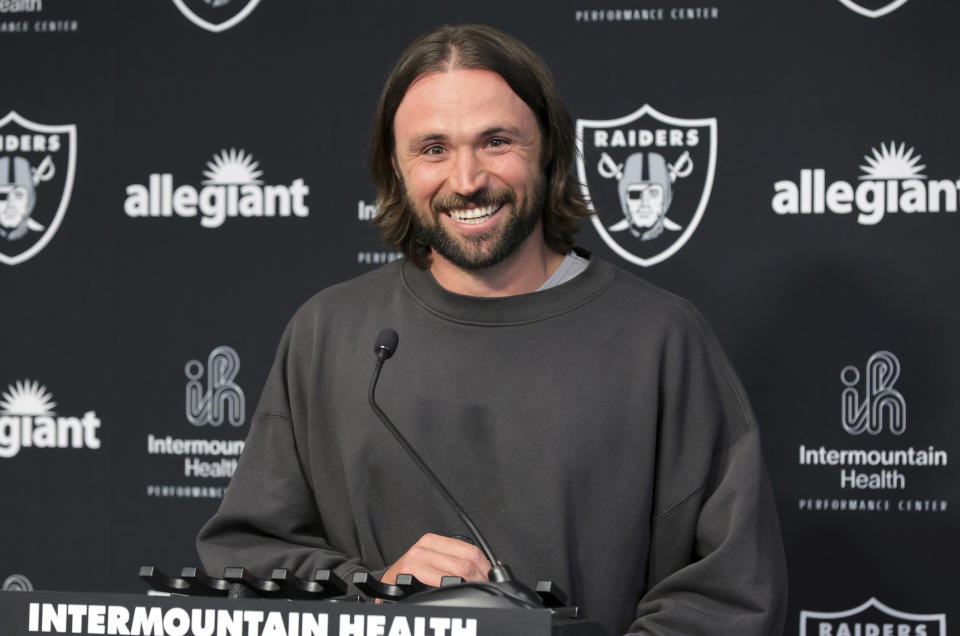 Las Vegas Raiders quarterback Gardner Minshew II smiles during an NFL football news conference, Thursday, March 14, 2024, in Henderson, Nev. (Steve Marcus/Las Vegas Sun via AP)