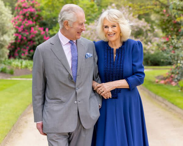 <p>Buckingham Palace/PA Wire </p> King Charles and Queen Camilla photographed on April 10, 2023 to mark the first anniversary of their coronation