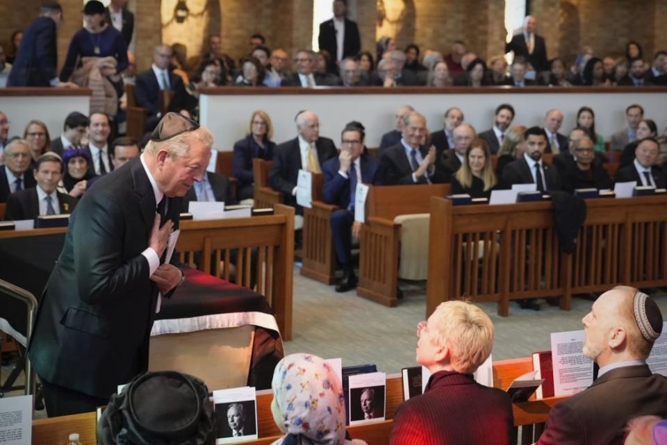 Former Vice President Al Gore offers his condolences to the Lieberman family during the funeral for former Sen. Joe Lieberman in Stamford, Conn., Friday, March. 29, 2024. (AP Photo/Bryan Woolston)