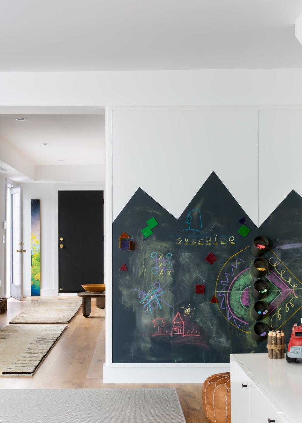 <p>Regan Baker used chalk paint to make a fun game room even more fun. This way they really can paint and draw all over the walls, consequence-free. </p>