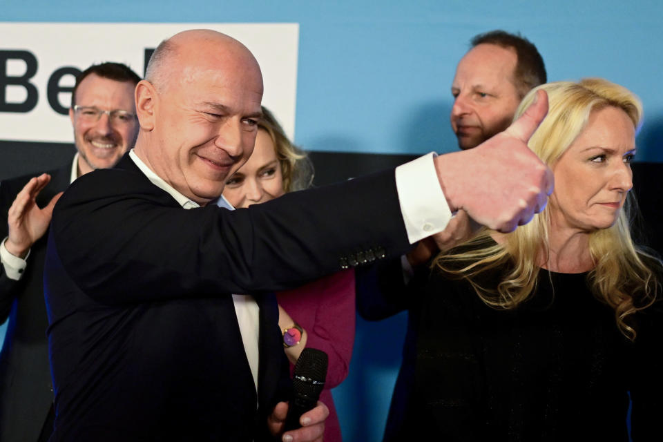 The top candidate of the Christian Democratic Union party (CDU), Kai Wegner, celebrates after the state elections in Berlin, Germany, Sunday, Feb. 12, 2023. The city of Berlin on Sunday, Feb. 12, 2023, holds a court-ordered rerun of a chaotic 2021 state election that was marred by severe glitches at many polling stations. (Fabian Sommer/dpa via AP)