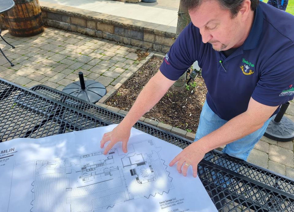 Jim Tavano, a partner in Hamlin Pub's developing St. Clair site, goes over site plans on Thursday, June 29, 2023.