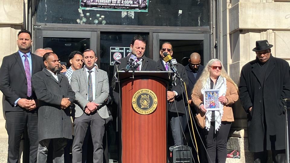 Paterson Mayor Andre Sayegh stands with clergy, community and elected leaders in a Presidents' Day appeal to President Joe Biden calling for a ceasefire in the Israel-Hamas war.