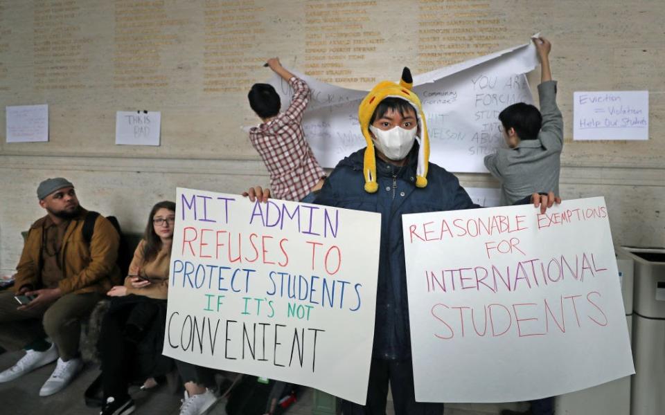 March 12: Frustrated international students protest against MIT’s decision to order them to evacuate campus. (Getty Images)