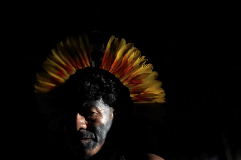 An indigenous man of Enawene-nawe tribe, is pictured during a four-day pow wow in Piaracu village, in Xingu Indigenous Park, near Sao Jose do Xingu, Mato Grosso state