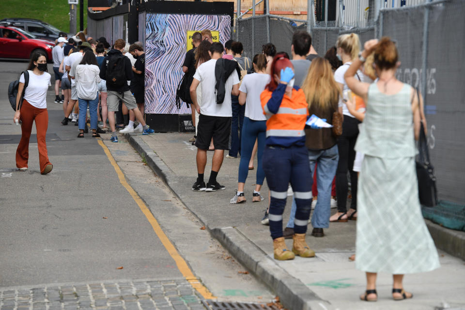 Members of the public queue for Covid PCR tests at a clinic in Redfern in Sydney, Friday, December 24, 2021.