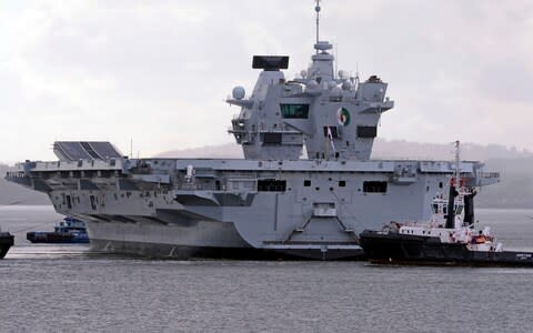 The Royal Navy aircraft carrier HMS Queen Elizabeth leaves Rosyth Dockyard - Credit: Getty