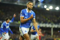 Everton's Dominic Calvert-Lewin celebrates after scoring his side's second goal during the English Premier League soccer match between Everton and Liverpool at the Goodison Park stadium in Liverpool, Britain, Wednesday, April 24, 2024. (AP Photo/Jon Super)