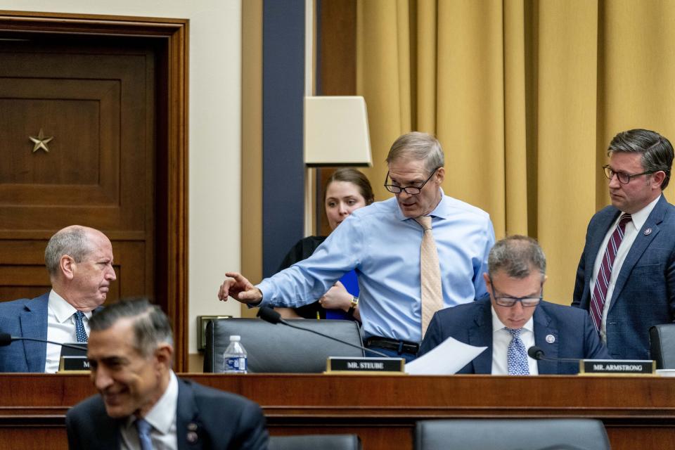 From left, Rep. Dan Bishop, R-N.C., Chairman Rep. Jim Jordan, R-Ohio, and Rep. Mike Johnson, R-La., speak during a House Judiciary subcommittee hearing on what Republicans say is the politicization of the FBI and Justice Department and attacks on American civil liberties, on Capitol Hill in Washington, Thursday, May 18, 2023. Also pictured is Rep. Darrell Issa, R-Calif., bottom left, and Rep. Kelly Armstrong, R-N.D., second from right. (AP Photo/Andrew Harnik)