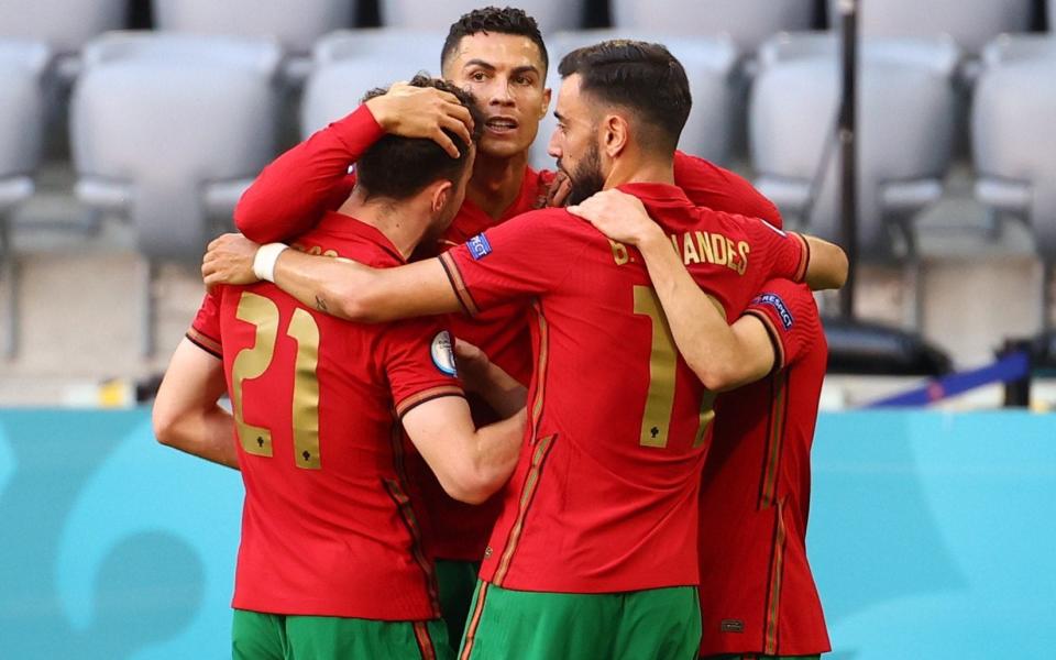 Cristiano Ronaldo celebrates with his teammates after scoring for Portugal against the run of play - REUTERS