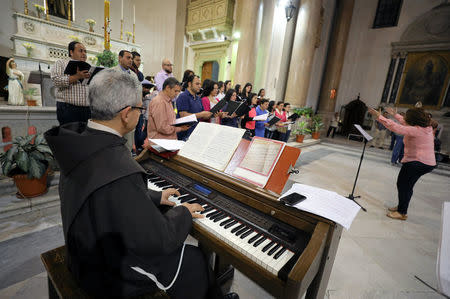 A choir prepares for celebrations of the upcoming Pope Francis' visit to Egypt, at Saint Joseph's Roman Catholic Church, in Cairo, Egypt April 23, 2017. REUTERS/Mohamed Abd El Ghany