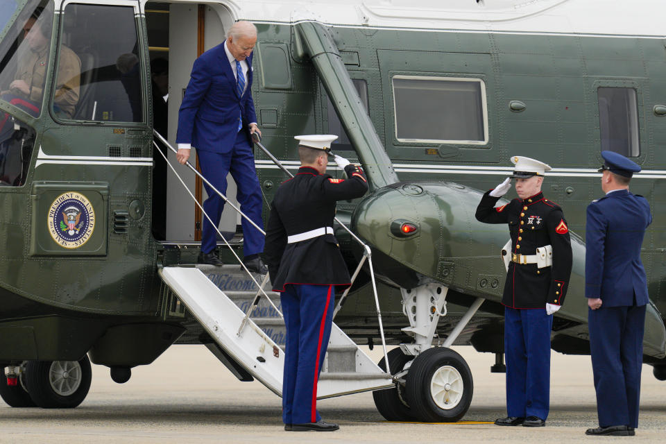 President Joe Biden steps off Marine One before boarding Air Force One at Andrews Air Force Base, Md., Thursday, Feb. 9, 2023, en route to Florida. (AP Photo/Jess Rapfogel)