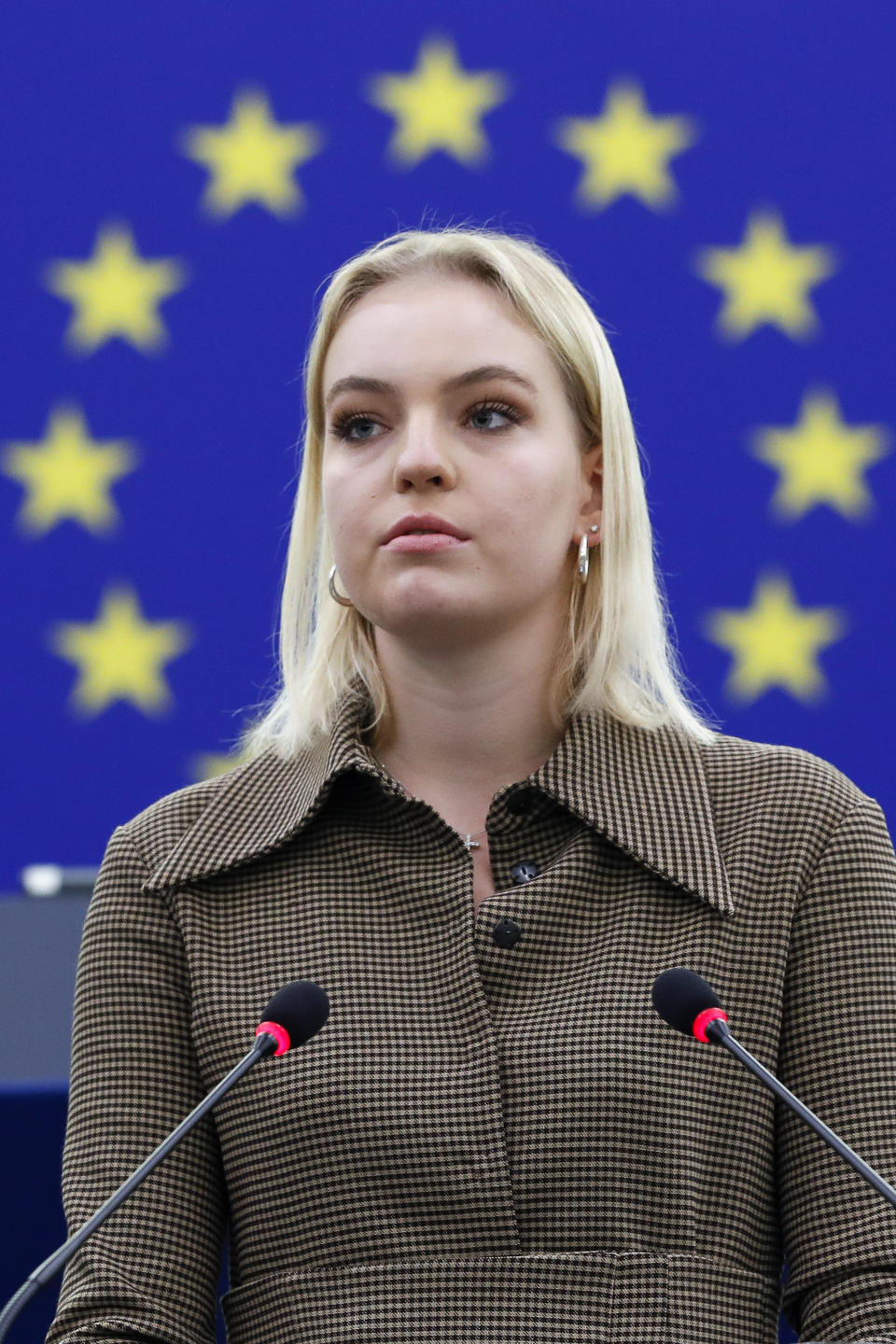 Daria Navalnaya, the daughter of jailed Russian opposition leader Alexei Navalny, delivers a speech during the Award of the Sakharov Prize ceremony at the European Parliament in Strasbourg, eastern France, Wednesday, Dec. 15, 2021. Daria Navalnaya receives the Sakharov Prize for Freedom of Thought Award, the European Union top human rights prize, on behalf of her father. (Julien Warnand, Pool Photo via AP)