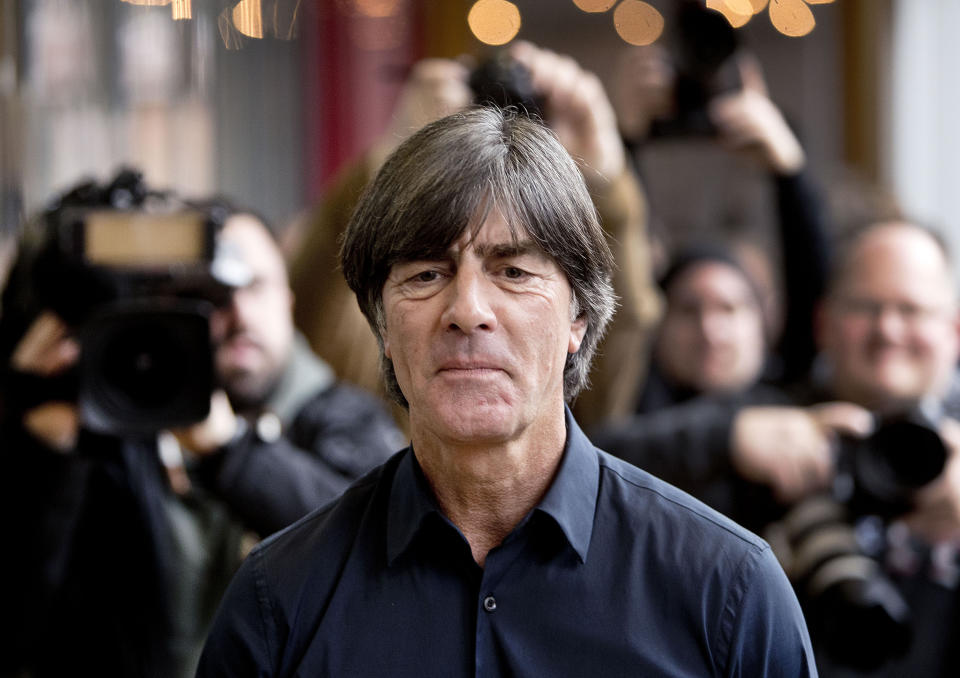 FILE - In this March 15, 2019, file photo,Coach of German national soccer team Joachim Loew is on his way to a news conference in Frankfurt, Germany. (AP Photo/Michael Probst,File)