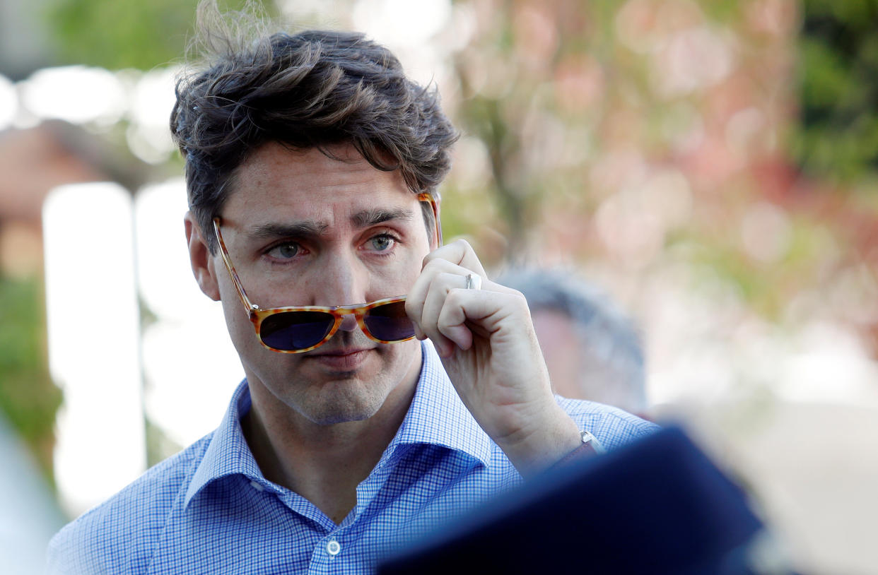 On Thursday, the headline of a viral Twitter moment summed up Canadian Prime Minster Justin Trudeau's socks appeal perfectly. (Photo: Remo Casilli/Reuters)