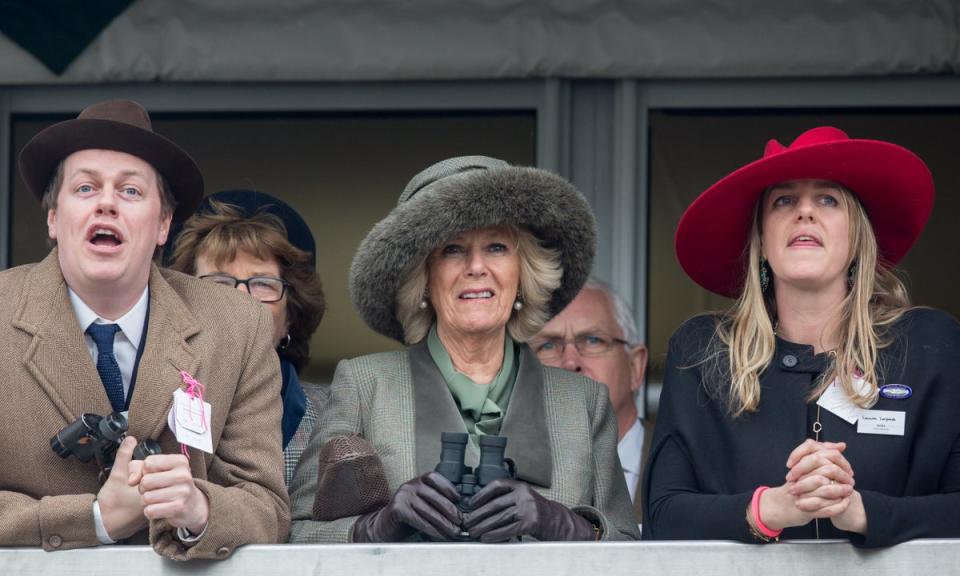 Camilla, Duchess of Cornwall (C) watches a race from the temporary Royal Box with her son Tom Parker Bowles and daughter Laura Lopes (Getty Images)