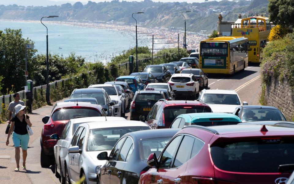 queues of cars heading to Bournemouth beach  - Corin Messer/BNPS