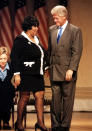 <p>Aretha Franklin receiving an award from President Bill Clinton and wife Hillary in 2000. (Rex) </p>