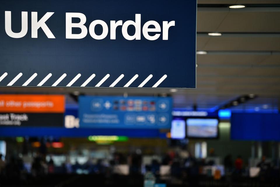 UK border signs are pictured at the passport control in Arrivals in Terminal 2 at Heathrow Airport in London on July 16, 2019 (Photo by Daniel LEAL-OLIVAS / AFP) (Photo by DANIEL LEAL-OLIVAS/AFP via Getty Images)