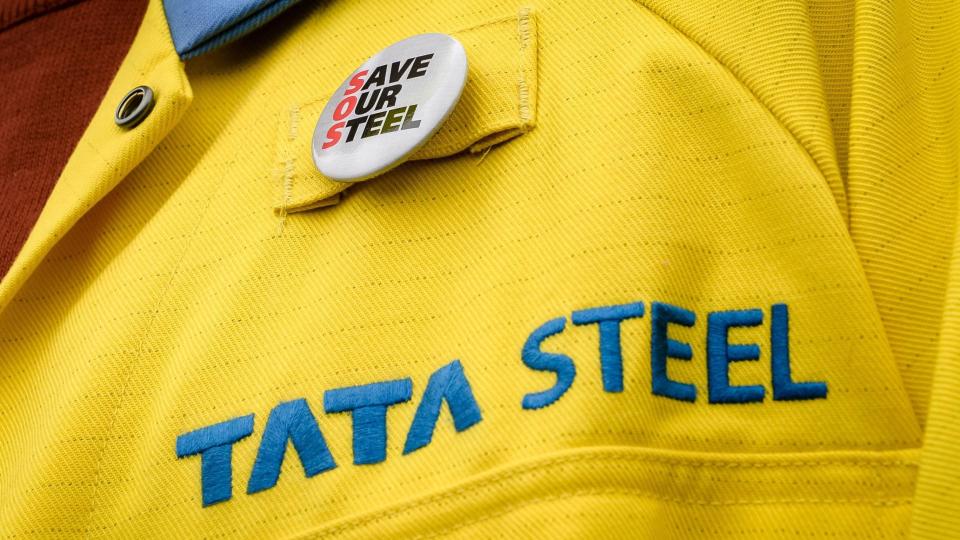 A steelworker wearing a Save our Steel badge