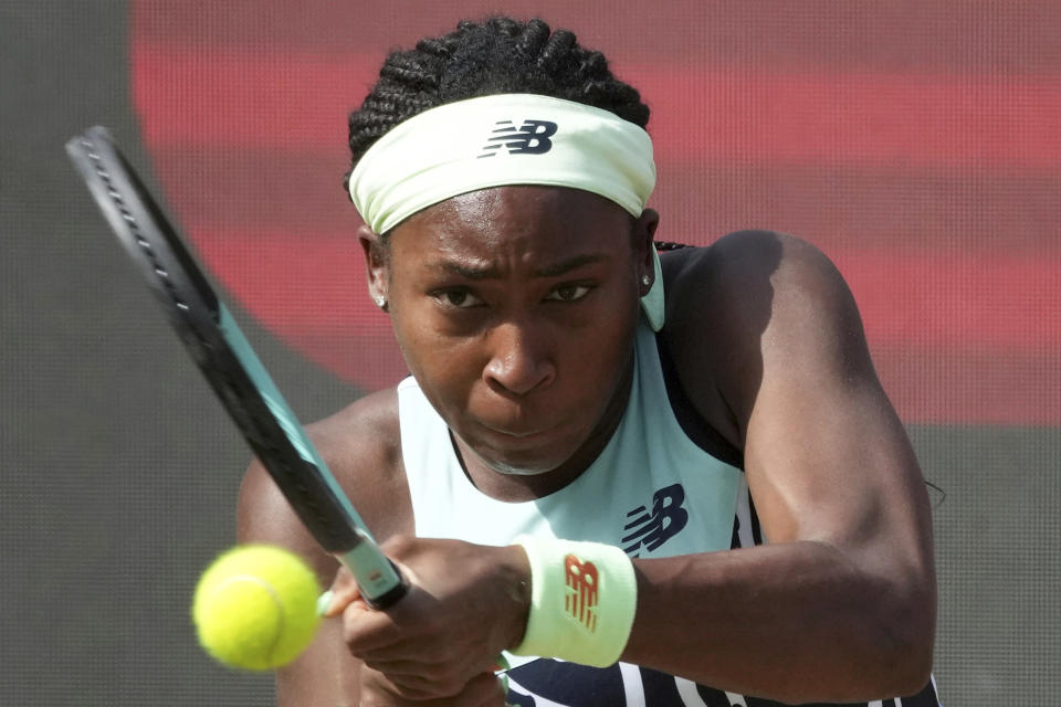 FILE - Coco Gauff returns the ball to Ons Jabeur, from Tunesia, during the WTA tournament semifinal tennis match in Berlin, Germany, Saturday, June 18, 2022. Gauff will be competing in the 2022 Wimbledon tennis tournament. (AP Photo/Michael Sohn, File)