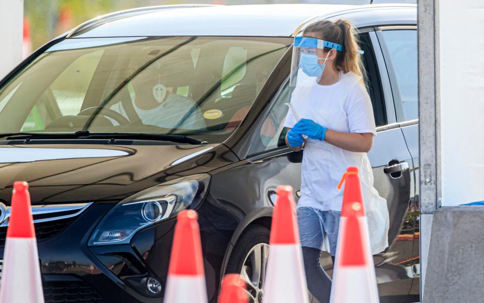 Samples are taken at a coronavirus testing facility in Temple Green Park and Ride, Leeds - Danny Lawson/PA