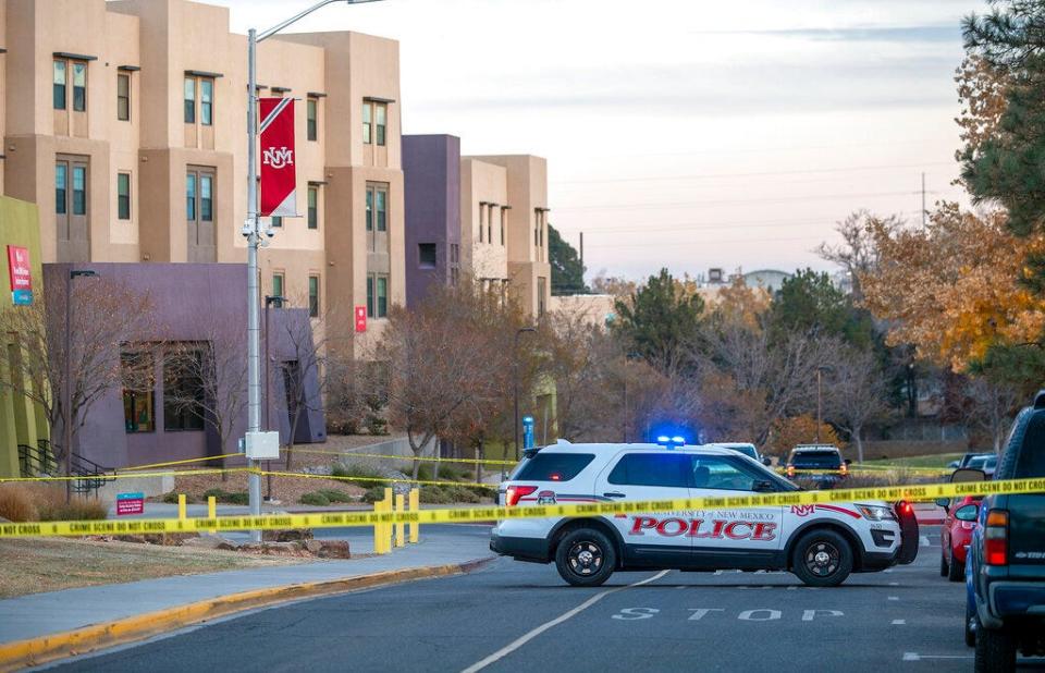 New Mexico State Police assists APD officers in investigating a deadly overnight shooting at Coronado Hall Dorms on the University of New Mexico campus, Saturday Nov. 19, 2022, in Albuquerque, N.M.