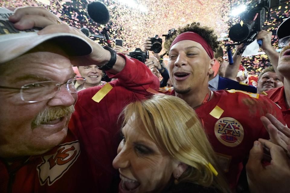 Kansas City Chiefs head coach Andy Reid, left, his wife Tammy Reid, center, and quarterback Patrick Mahomes celebrate after the Chiefs defeated the San Francisco 49ers in the NFL Super Bowl 54 football game Sunday, Feb. 2, 2020, in Miami Gardens, Fla. (AP Photo/David J. Phillip)