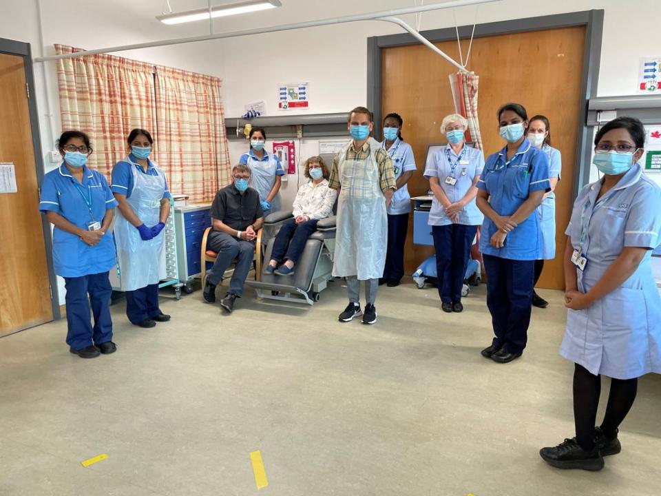 Andrew and Helen Clarke with the clinical trials team (University of Manchester/PA) (PA Wire)