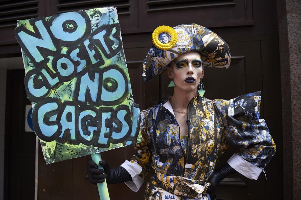 A drag queen joins protesters against the UK visit of US President Donald Trump as they gather to take part in a march and rally in London.