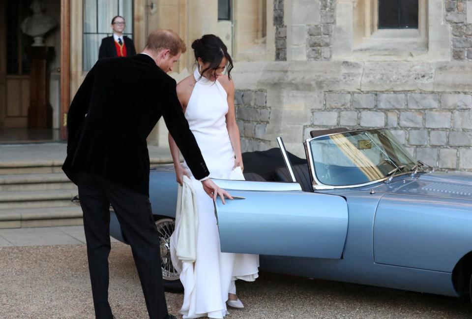 Her second look was revealed as she and Harry left Windsor in a classic Jag (REUTERS)