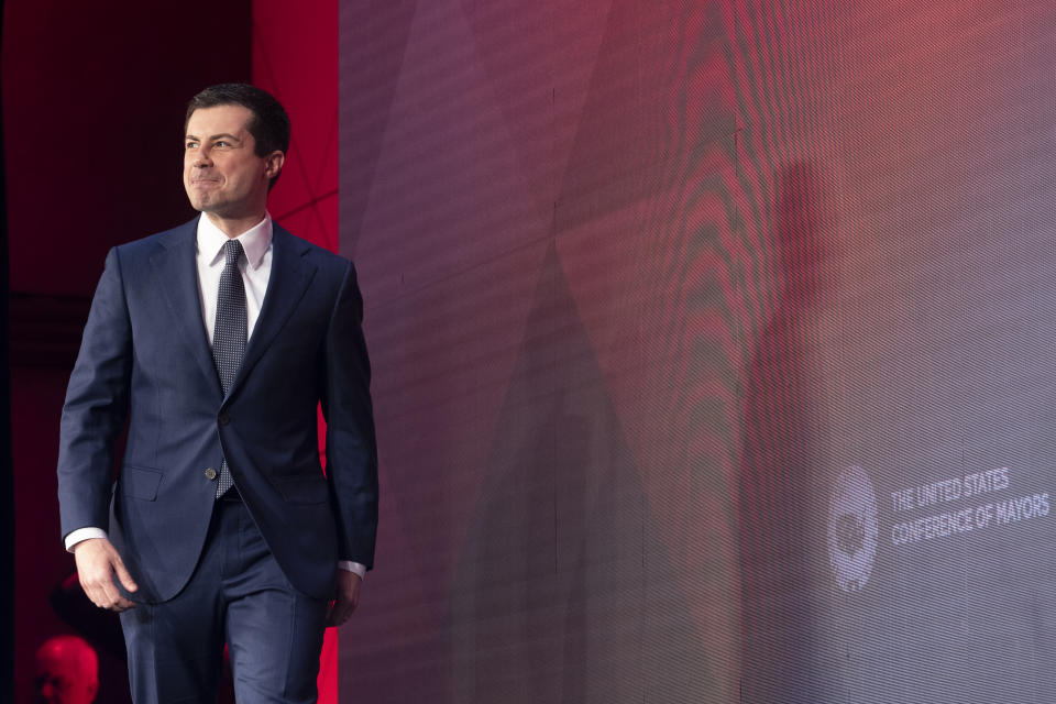 Democratic presidential candidate former South Bend, Ind., Mayor Pete Buttigieg, walks onstage to speak at the ​U.S. Conference of Mayors' Winter Meeting, Thursday, Jan. 23, 2020, in Washington. (AP Photo/Cliff Owen)
